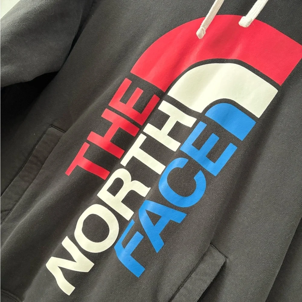 The North Face Men's Black Hoodie with Red and Blue Logo